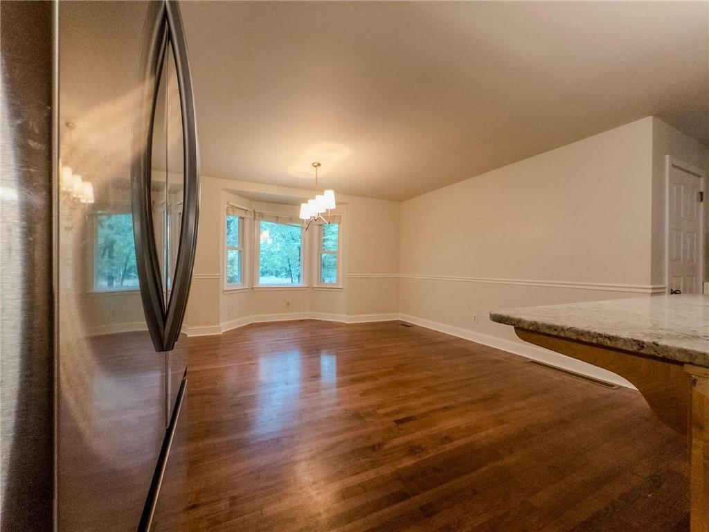 90 Howard Road Senoia, GA 30276 - Photo 54 of 73 a view of a room with wooden floor and a window