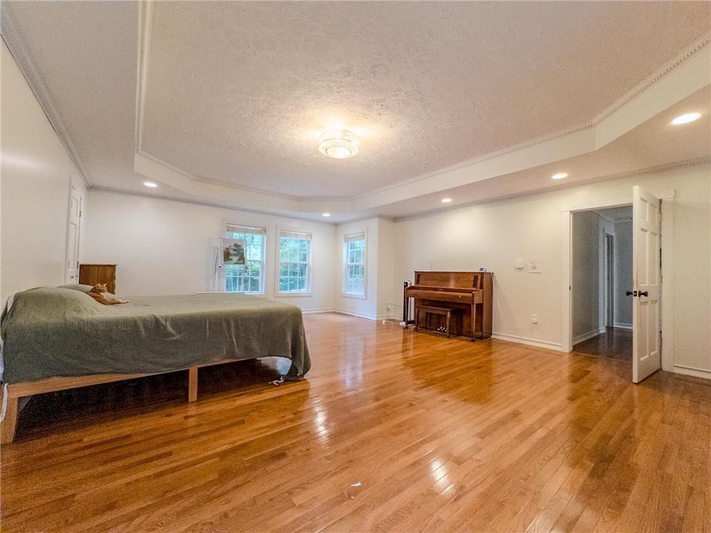 90 Howard Road Senoia, GA 30276 - Photo 56 of 73 a spacious bedroom with a bed and a view of bedroom