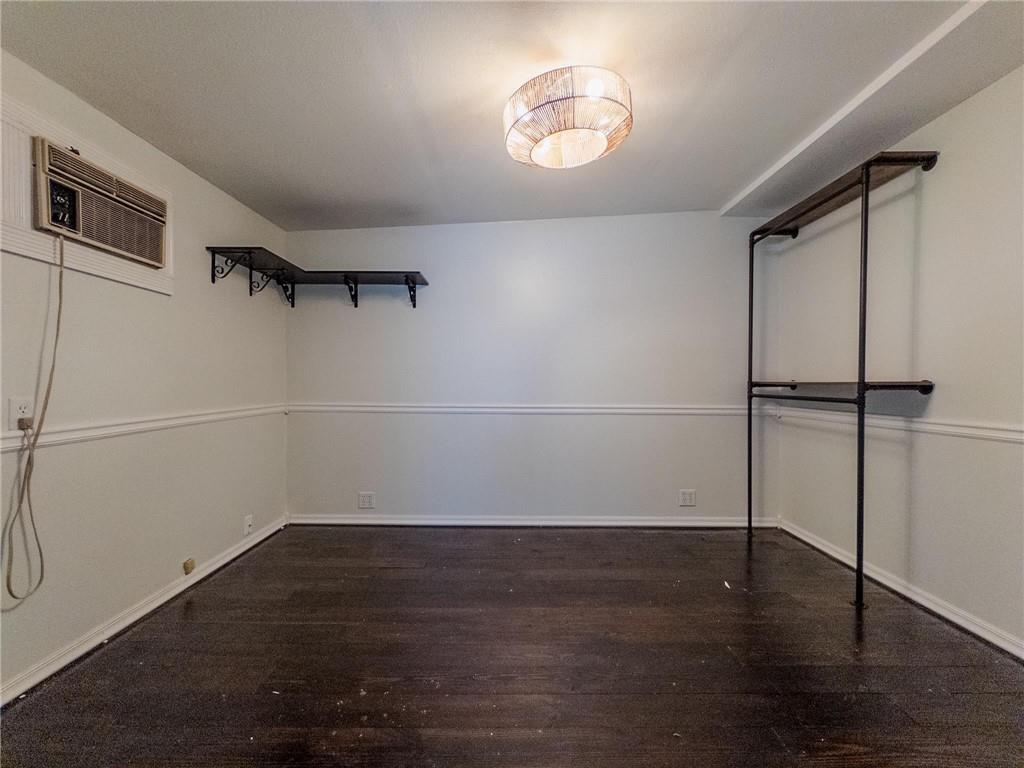 90 Howard Road Senoia, GA 30276 - Photo 69 of 73 an empty room with wooden floor and ceiling fan