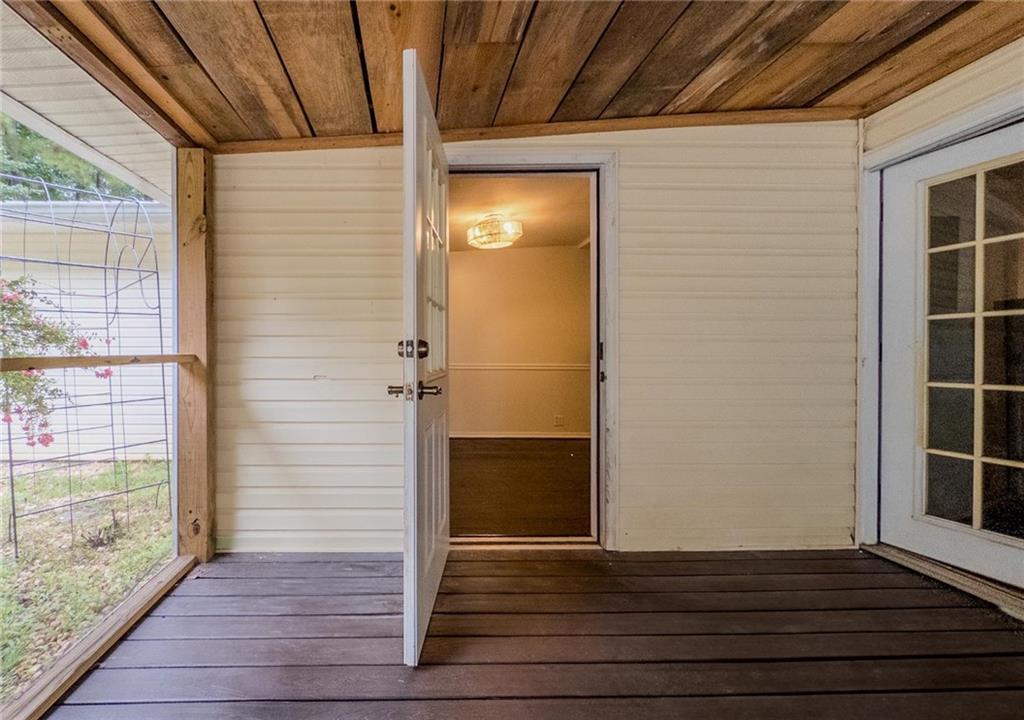 90 Howard Road Senoia, GA 30276 - Photo 71 of 73 a view of empty room with wooden floor and fan
