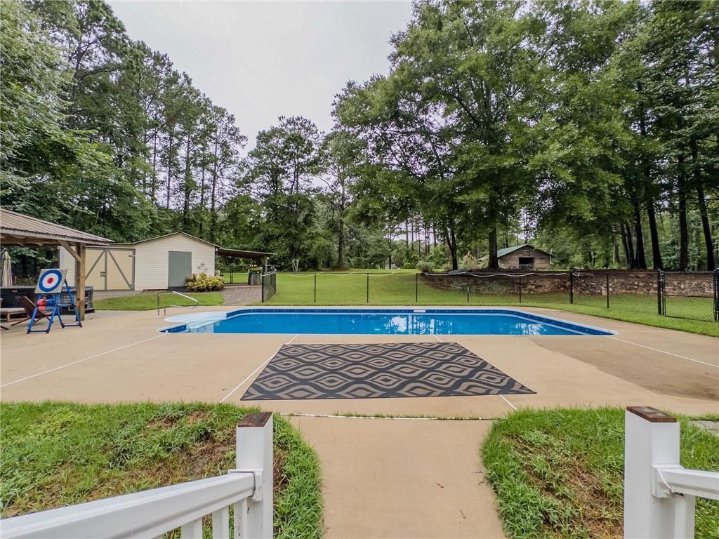 90 Howard Road Senoia, GA 30276 - Photo 72 of 73 a view of a backyard with swimming pool