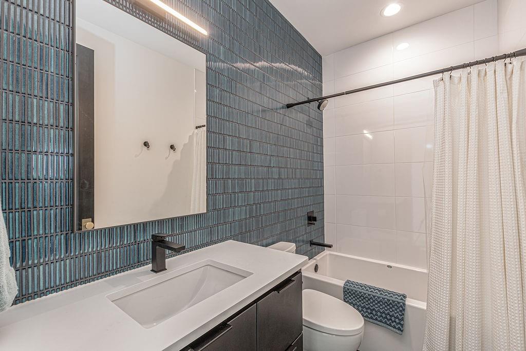 2396 County Road 2145 Cooper, TX 75432 - Photo 29 of 40 a bathroom with a sink toilet and shower