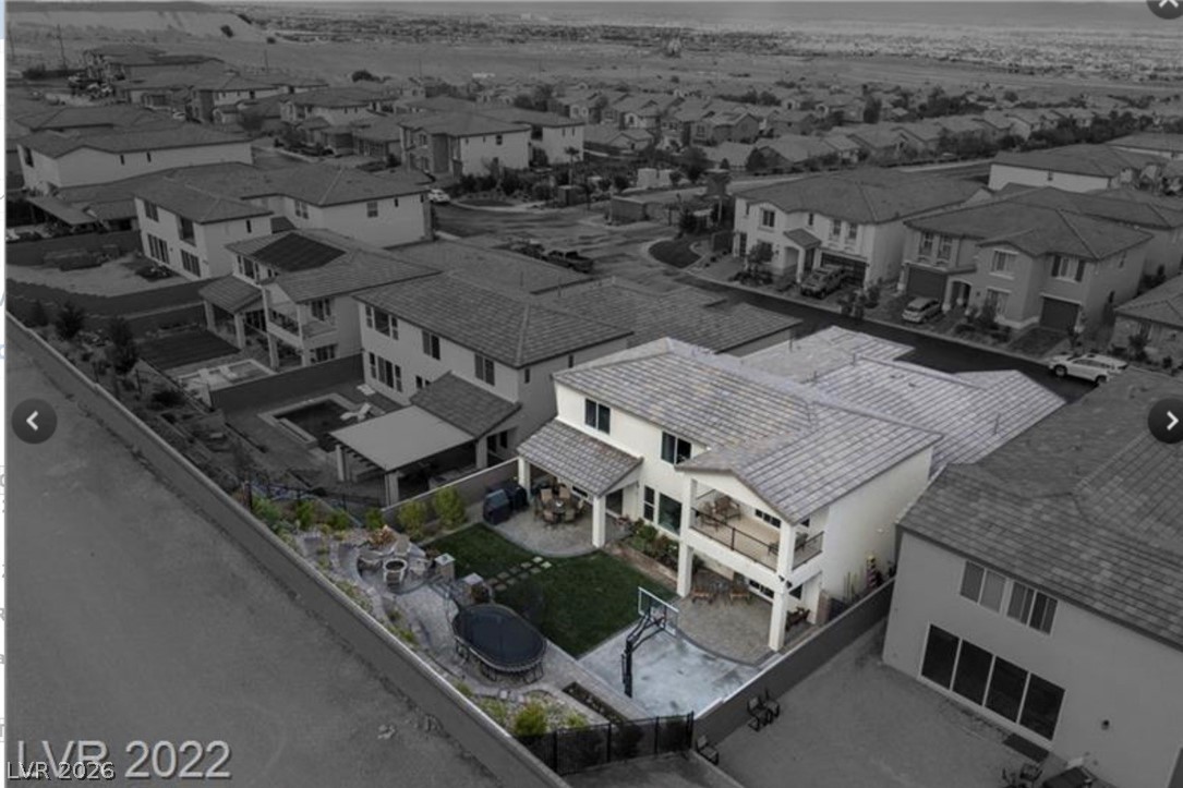 4631 Amazing View Street Las Vegas, NV 89129 - Photo 26 of 33 An aerial perspective reveals a spacious backyard with a private pool, basketball court, and inviting patio areas.