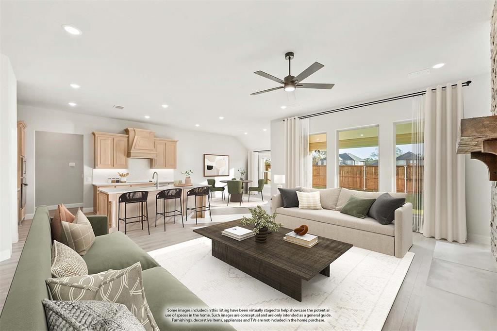 34 Osprey Street Joshua, TX 76058 - Photo 11 of 36 a living room with furniture wooden floor and a large window