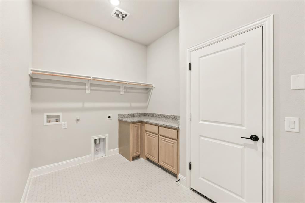 34 Osprey Street Joshua, TX 76058 - Photo 25 of 36 a bathroom with a shower and a sink