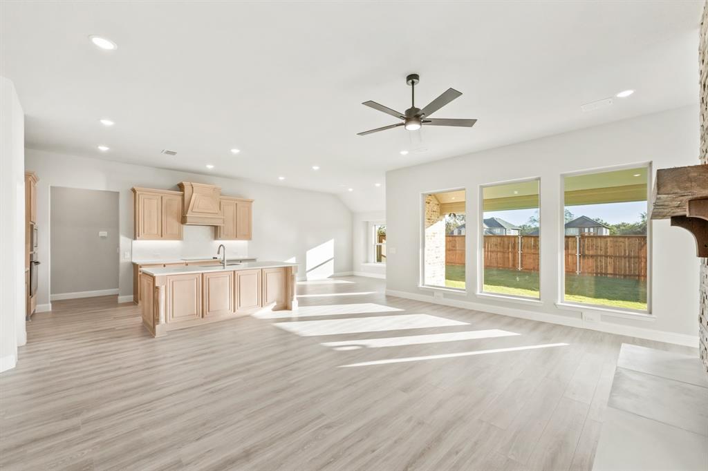 34 Osprey Street Joshua, TX 76058 - Photo 10 of 36 a view of a kitchen with a sink and a window