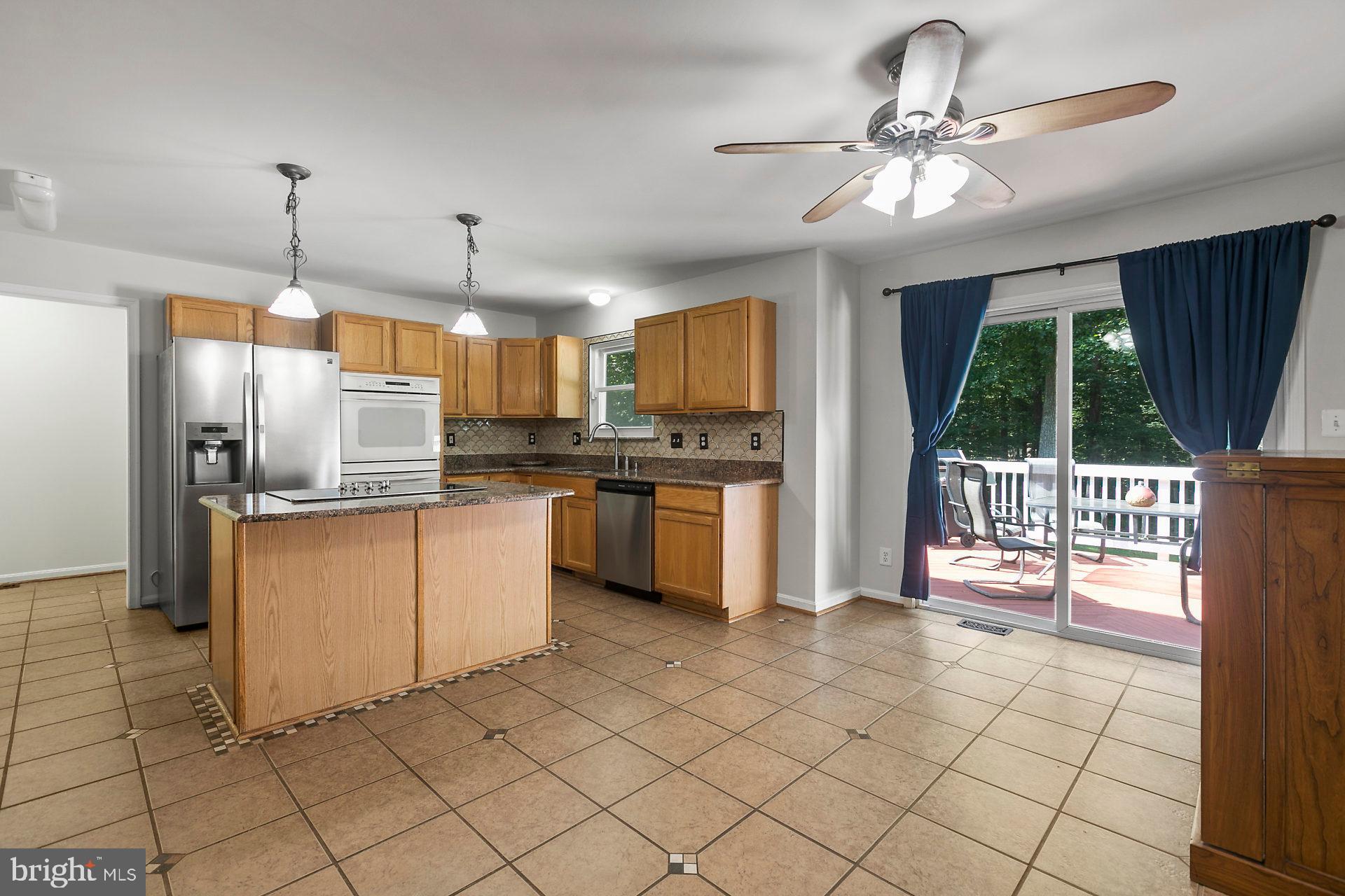 1837 Lottie Fowler Road Prince Frederick, MD 20678 - Photo 18 of 43 Spacious Kitchen With Granite Counters
