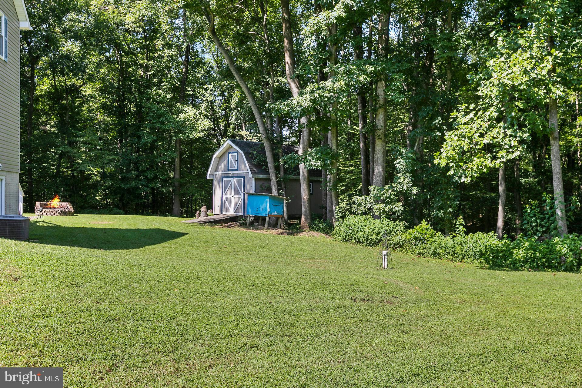 1837 Lottie Fowler Road Prince Frederick, MD 20678 - Photo 4 of 43 The Level Side Yard, as Long as a Football Field!