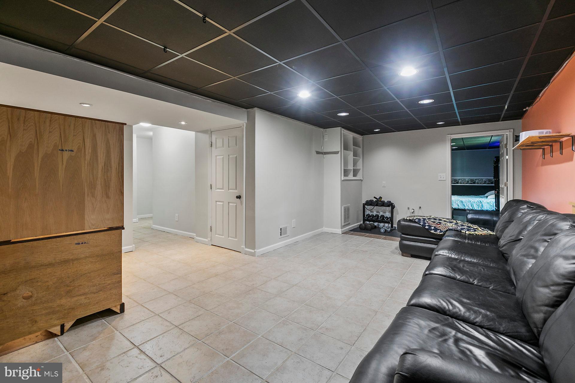 1837 Lottie Fowler Road Prince Frederick, MD 20678 - Photo 37 of 43 Large Basement Rec Area with Walk Out