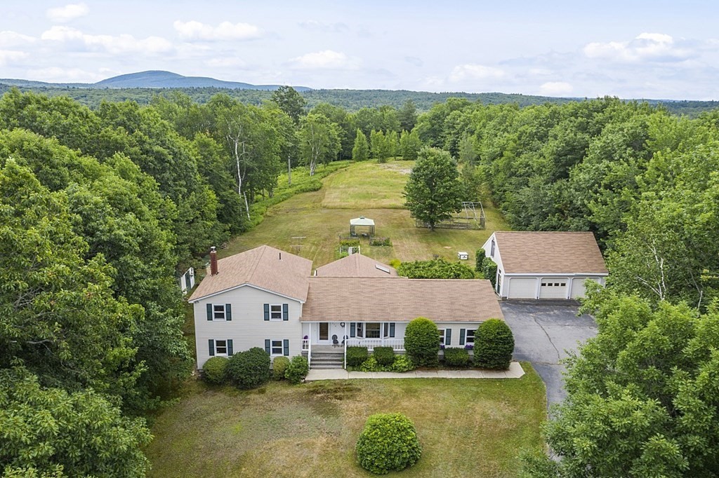 176 Ellis Road Westminster, MA 01473 - Photo 1 of 42 an aerial view of a house with a garden and a yard