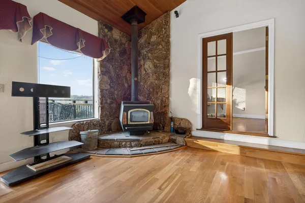 a kitchen with a stove a sink and a refrigerator