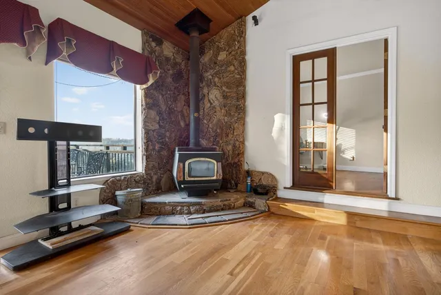 a kitchen with a stove a sink and a refrigerator