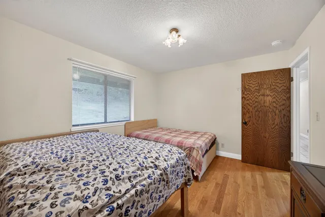 a bathroom with a sink double vanity and a mirror