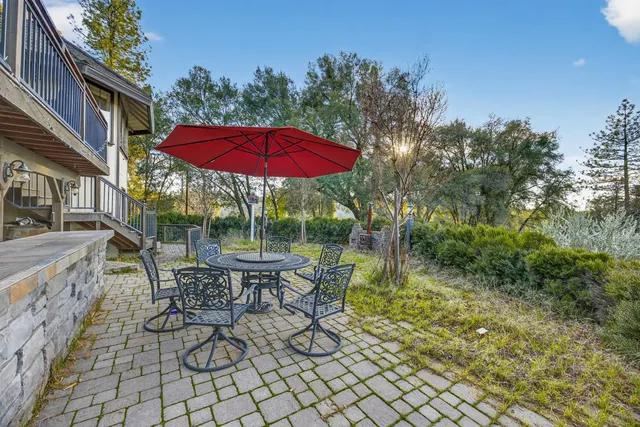 a view of a cafe with sitting area
