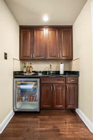 a kitchen with a cabinets and a stove top oven