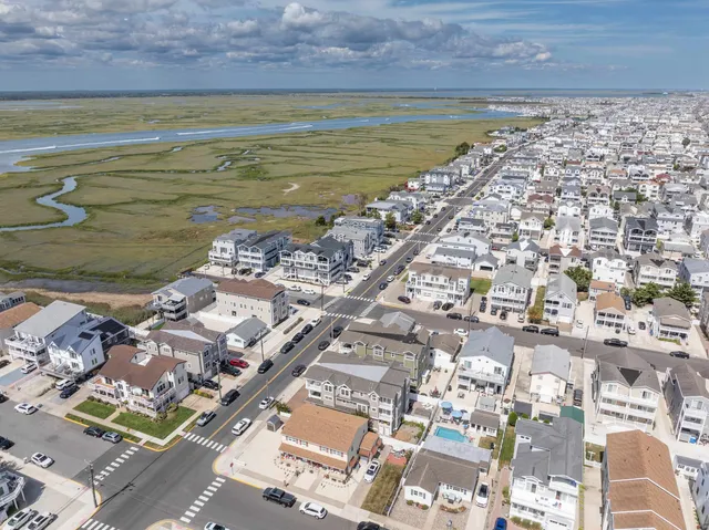 a view of a city with an ocean view