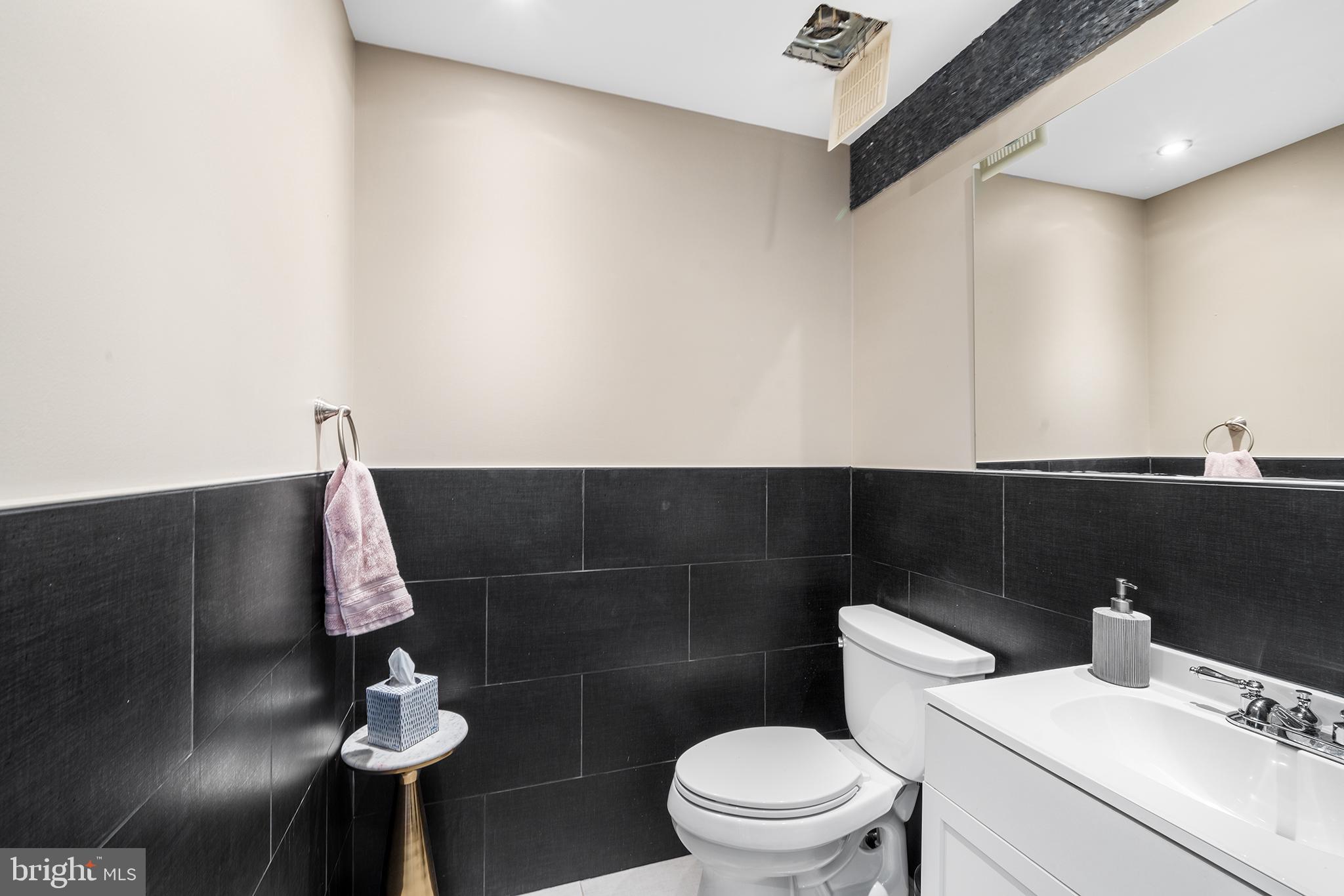 1927 Poplar Street, Unit B Philadelphia, PA 19130 - Photo 12 of 27 a bathroom with a toilet and a sink