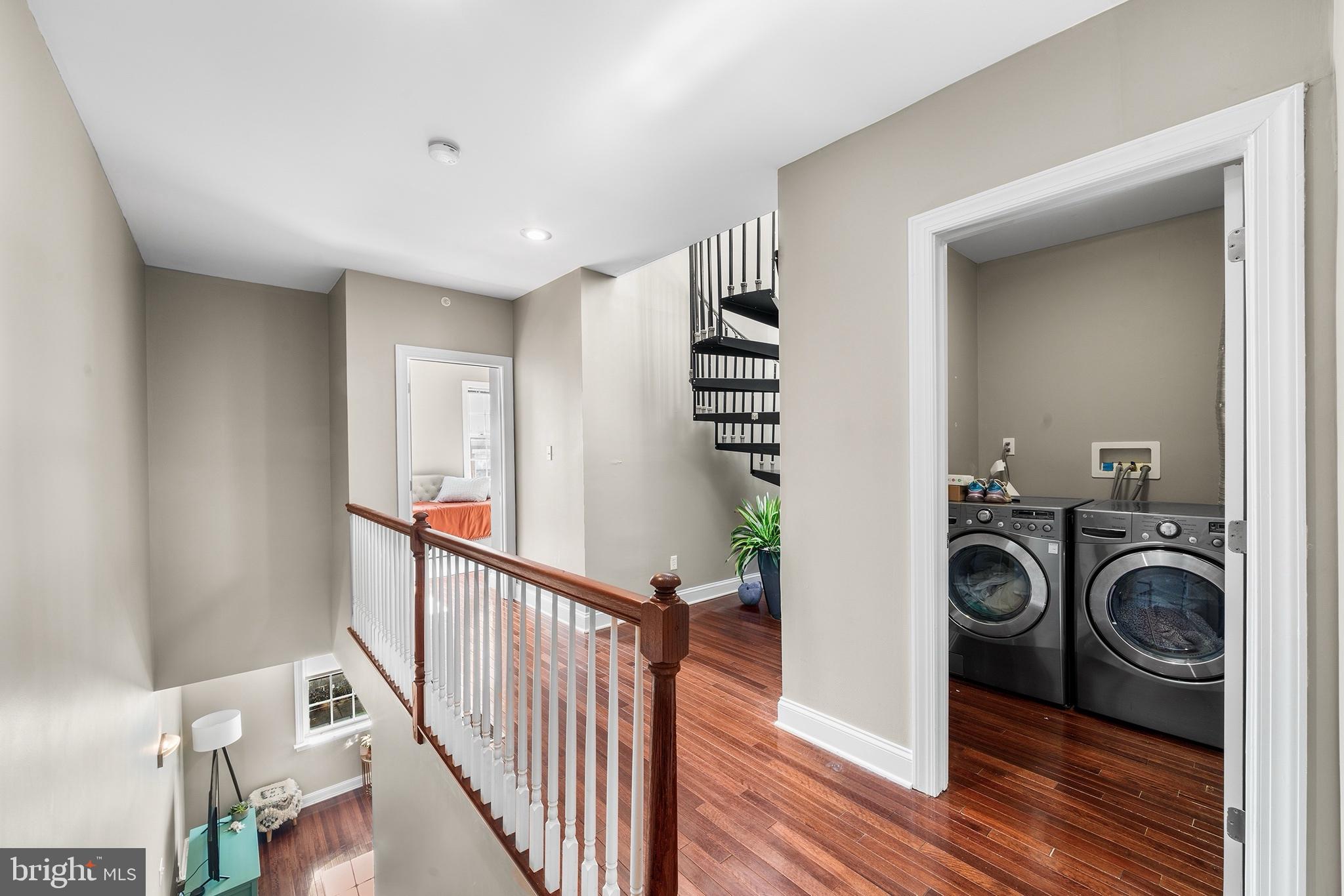 1927 Poplar Street, Unit B Philadelphia, PA 19130 - Photo 15 of 27 a view of a hallway with washer and dryer