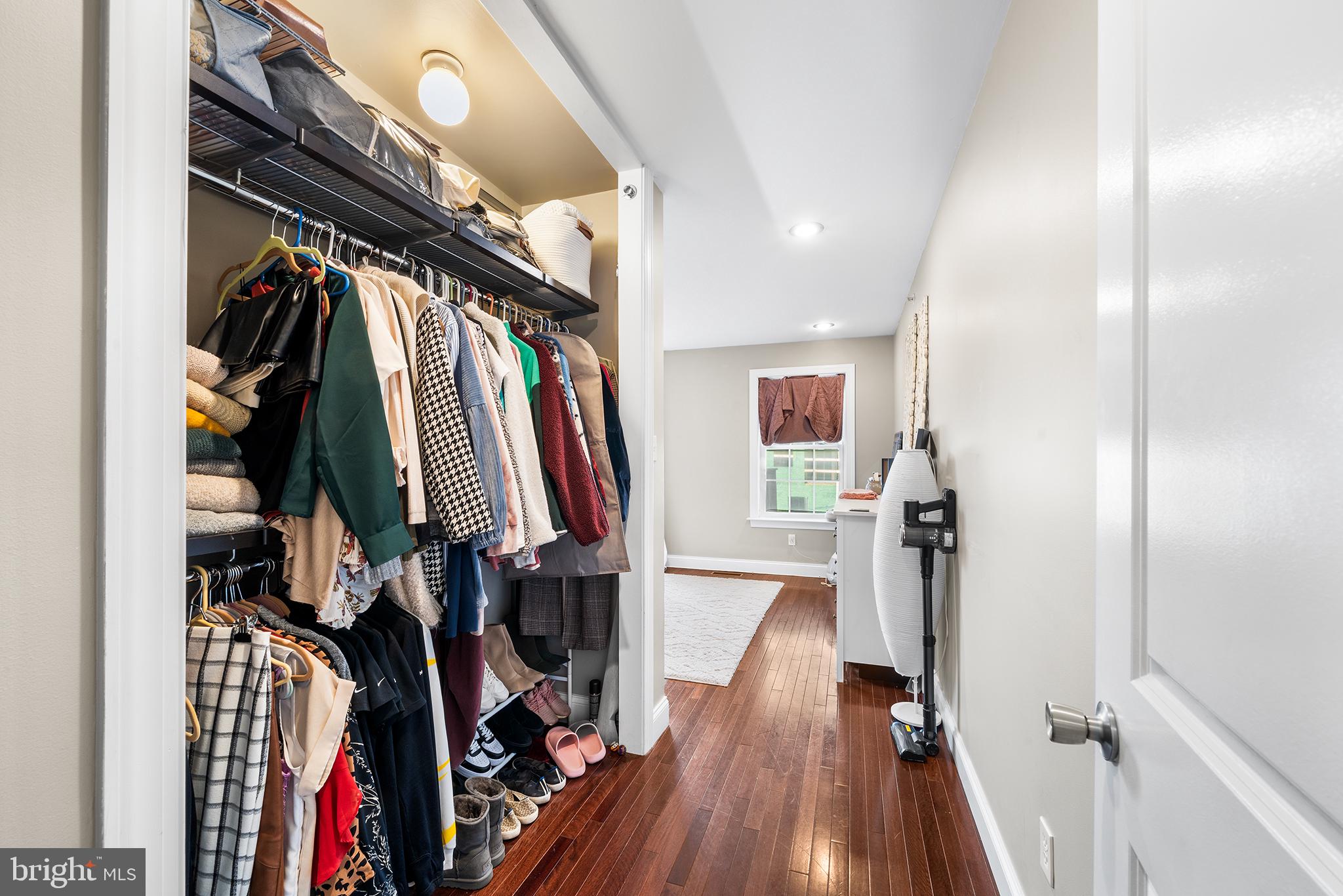 1927 Poplar Street, Unit B Philadelphia, PA 19130 - Photo 16 of 27 a view of walk in closet with clothes and shoes
