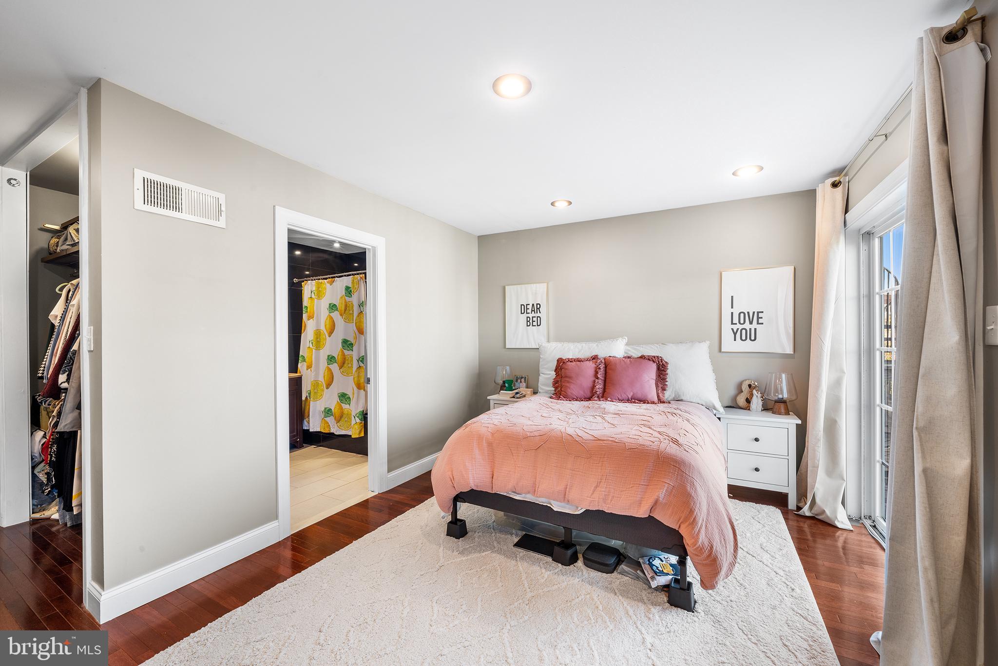 1927 Poplar Street, Unit B Philadelphia, PA 19130 - Photo 18 of 27 a bedroom with a bed and a window