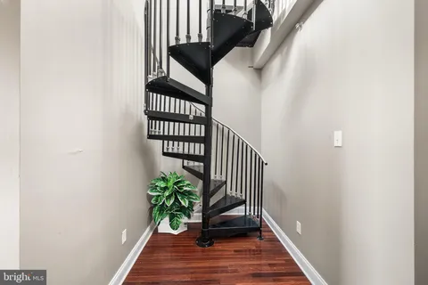 a view of entryway with wooden floor
