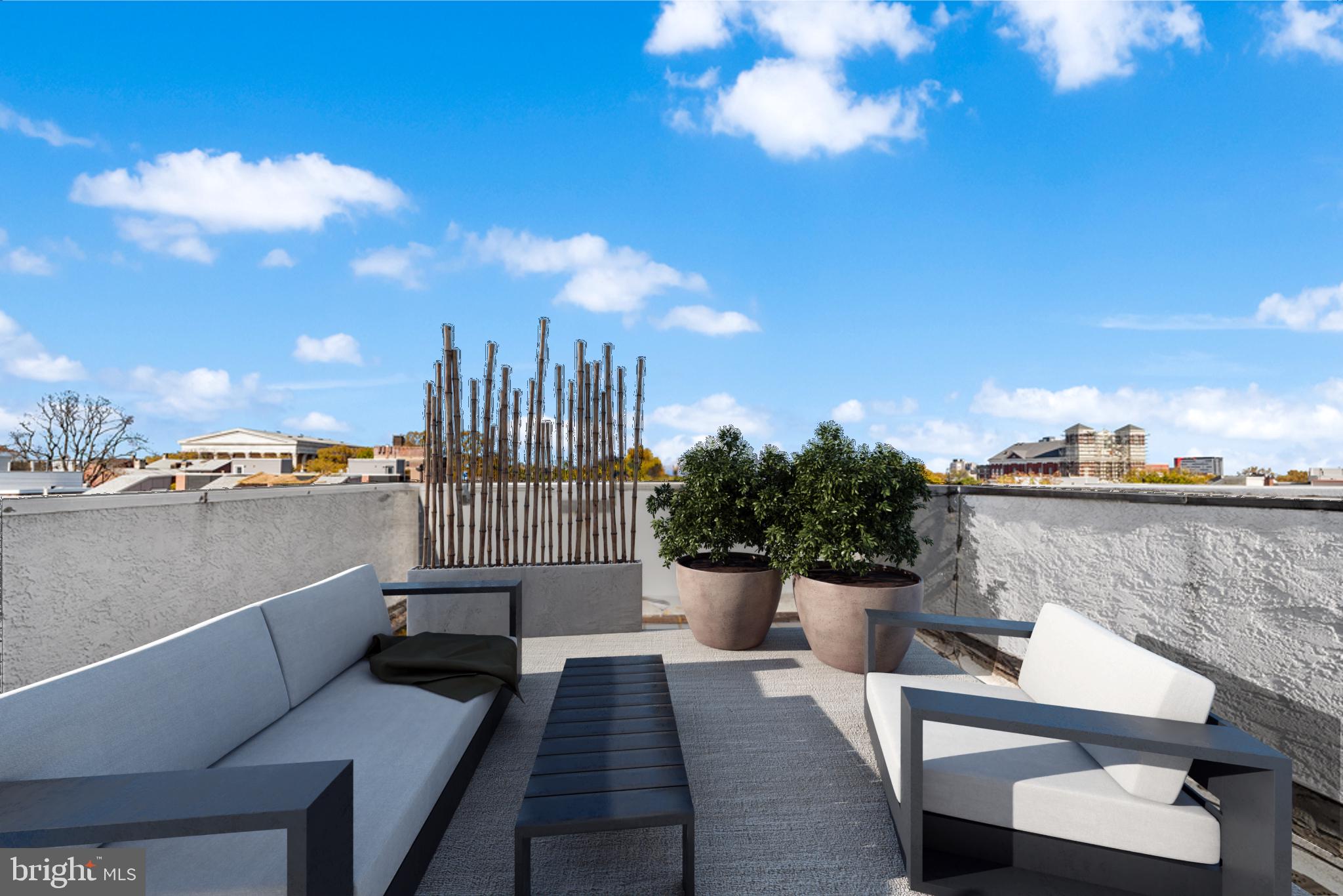 1927 Poplar Street, Unit B Philadelphia, PA 19130 - Photo 25 of 27 a view of roof deck with seating space