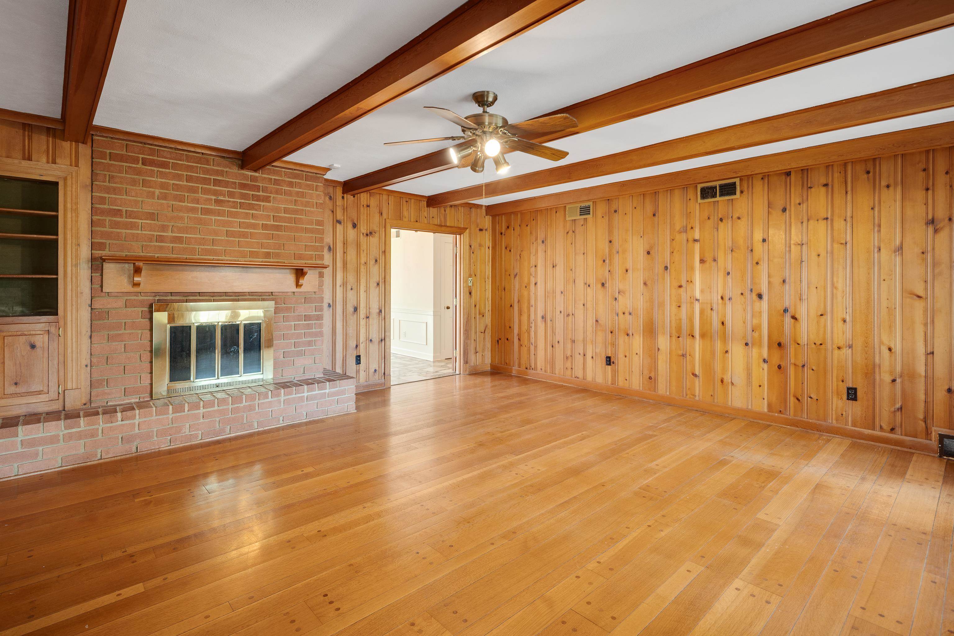 685 South Perkins Road Memphis, TN 38117 - Photo 18 of 40 a view of empty room with wooden floor and fan