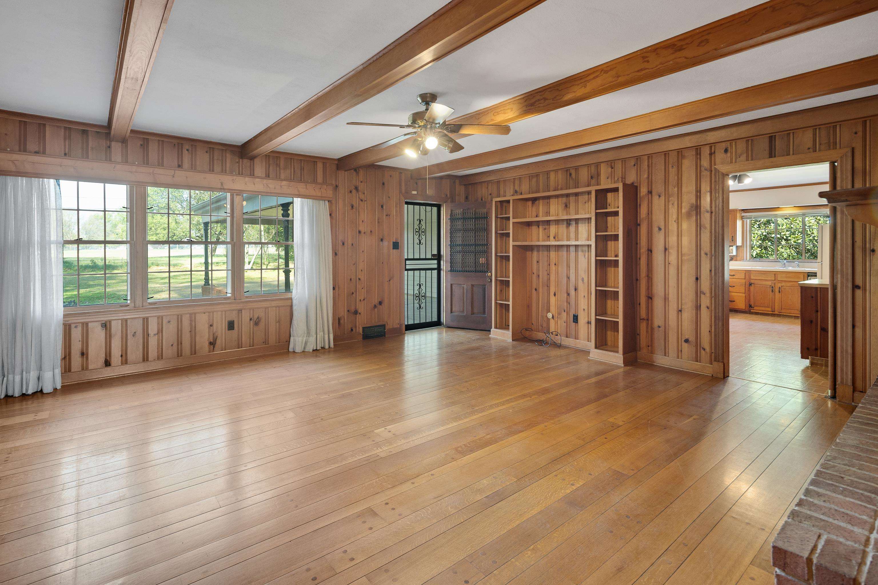 685 South Perkins Road Memphis, TN 38117 - Photo 21 of 40 an empty room with wooden floor and windows