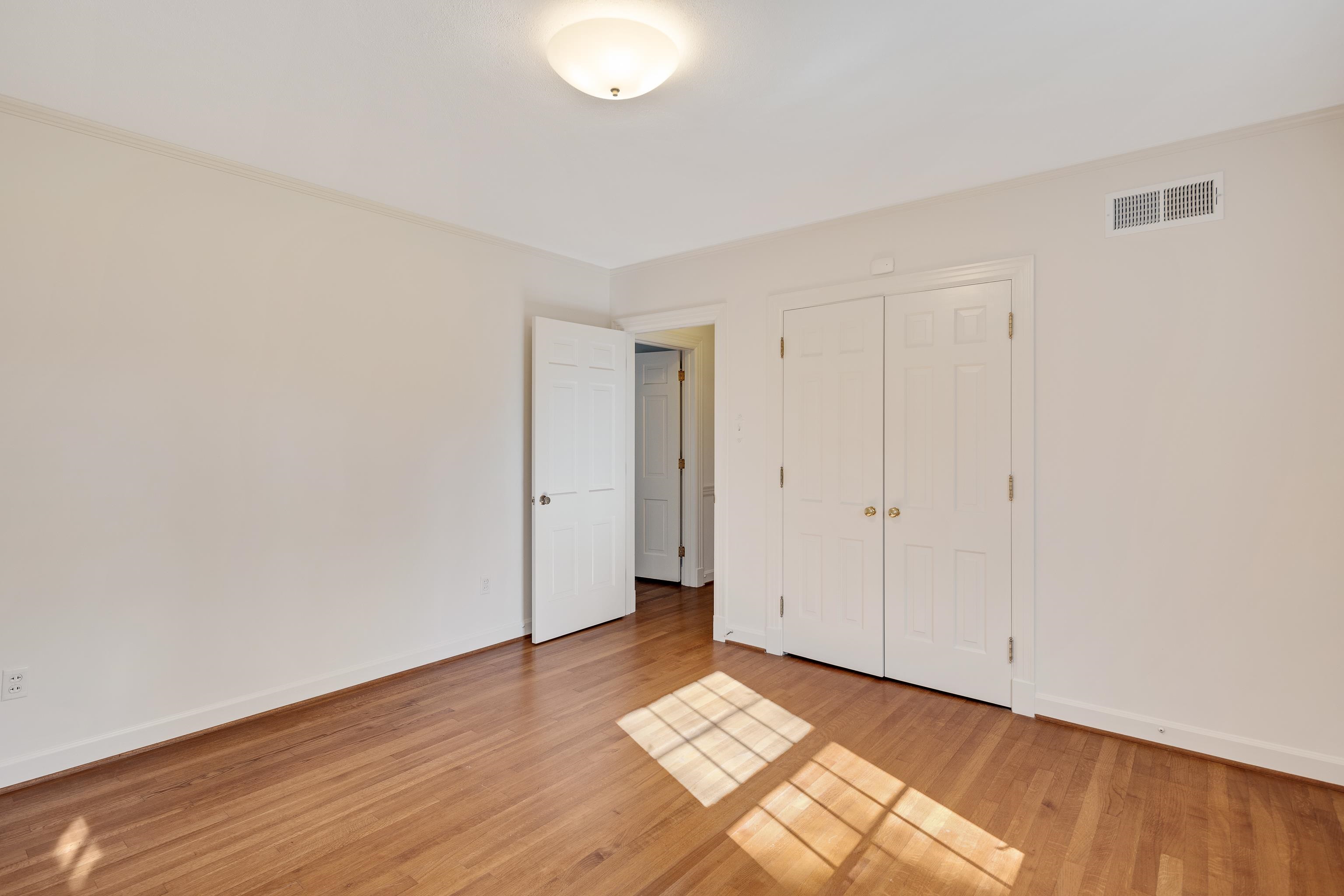685 South Perkins Road Memphis, TN 38117 - Photo 27 of 40 a view of an empty room and wooden floor