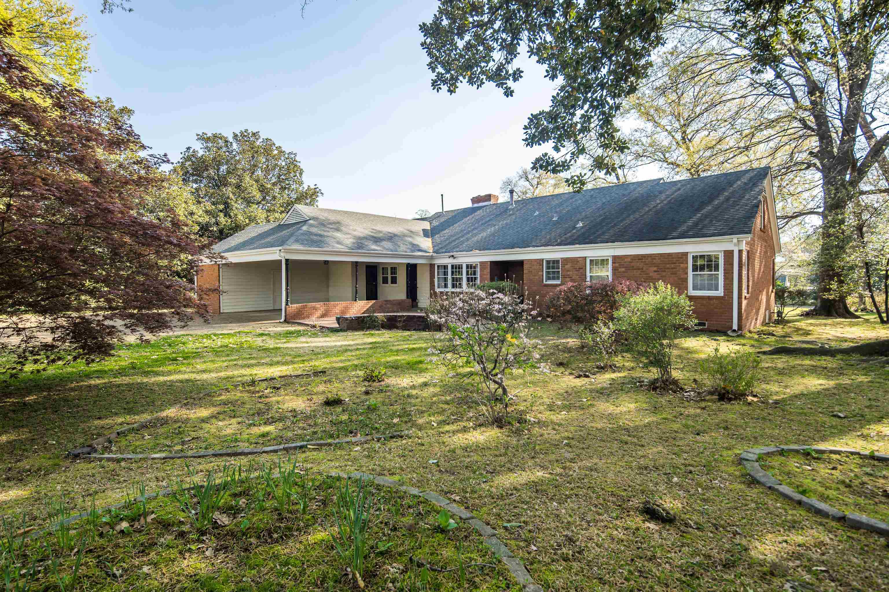 685 South Perkins Road Memphis, TN 38117 - Photo 40 of 40 a front view of house with yard and trees around