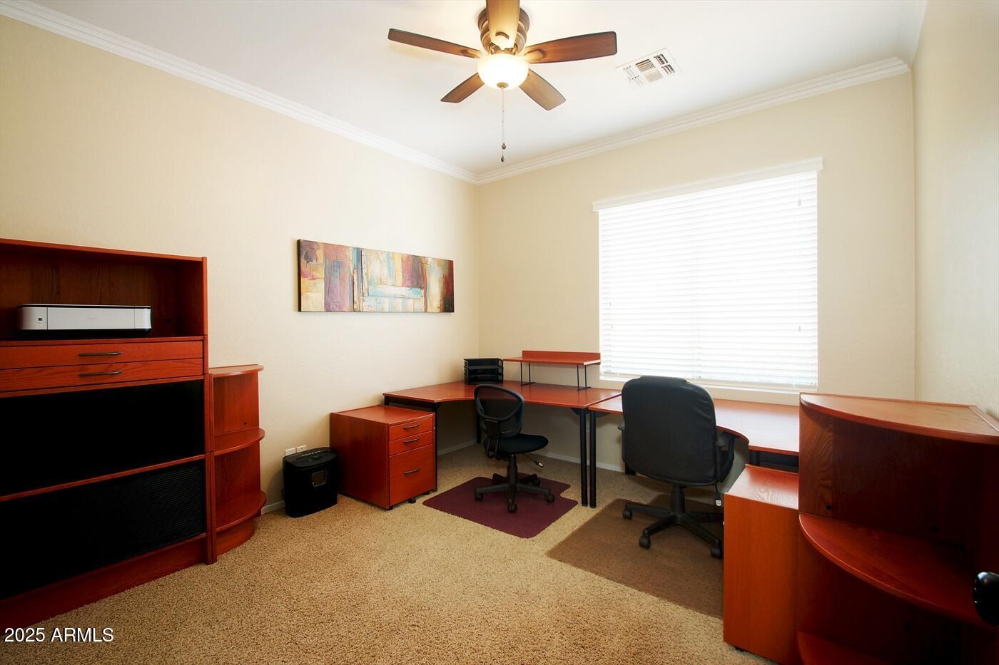 239 West Desert Avenue Gilbert, AZ 85233 - Photo 20 of 38 a view of a workspace with furniture and a window