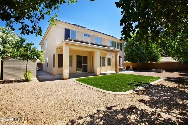 a view of balcony with yard