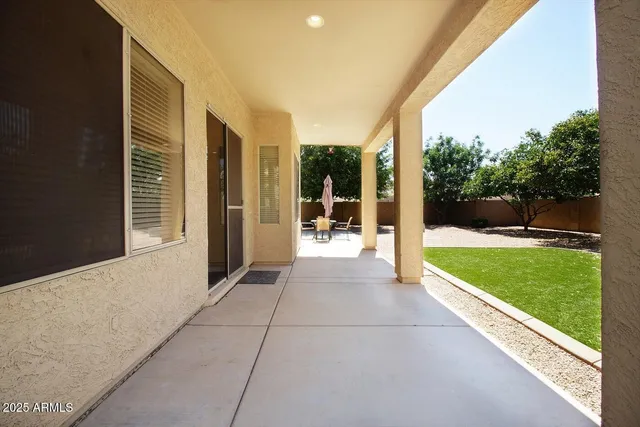 a view of a back yard of the house