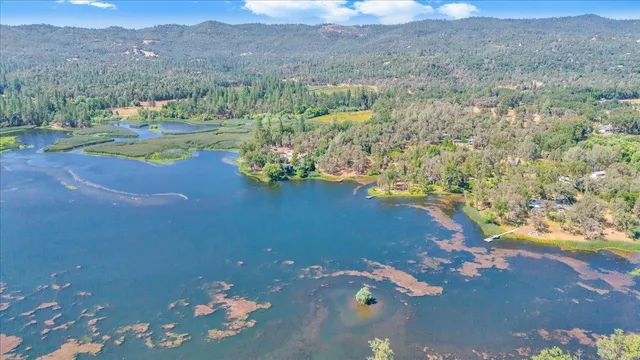 a view of a lake with mountain