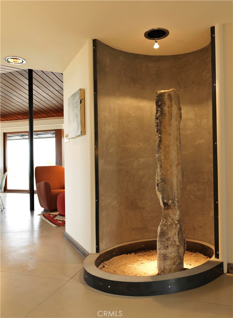 5960 Sunrise Road Twentynine Palms, CA 92277 - Photo 13 of 65 a view of a livingroom with furniture and a floor to ceiling window