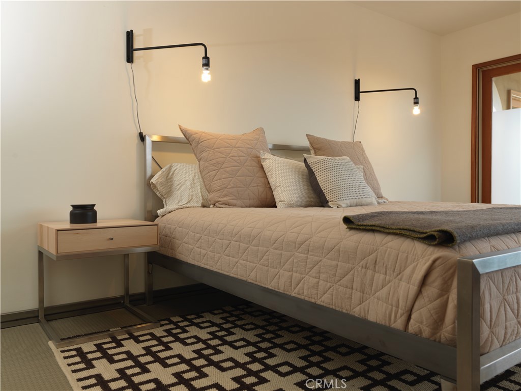 5960 Sunrise Road Twentynine Palms, CA 92277 - Photo 28 of 65 a bedroom with a bed and a window