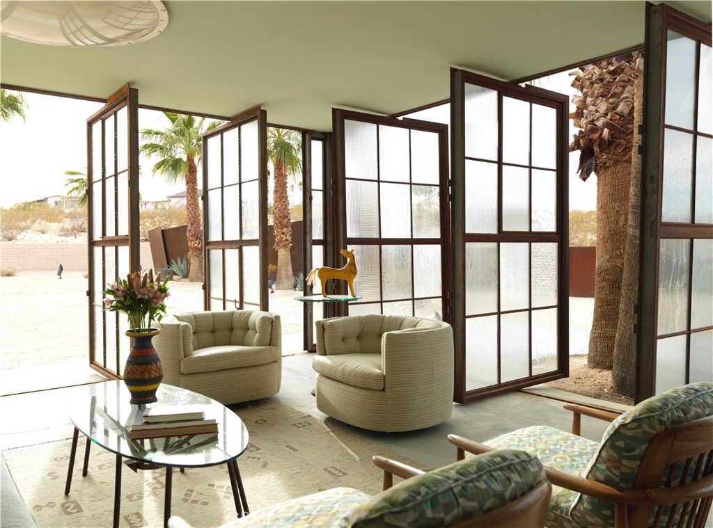 5960 Sunrise Road Twentynine Palms, CA 92277 - Photo 39 of 65 a living room with furniture and a large window