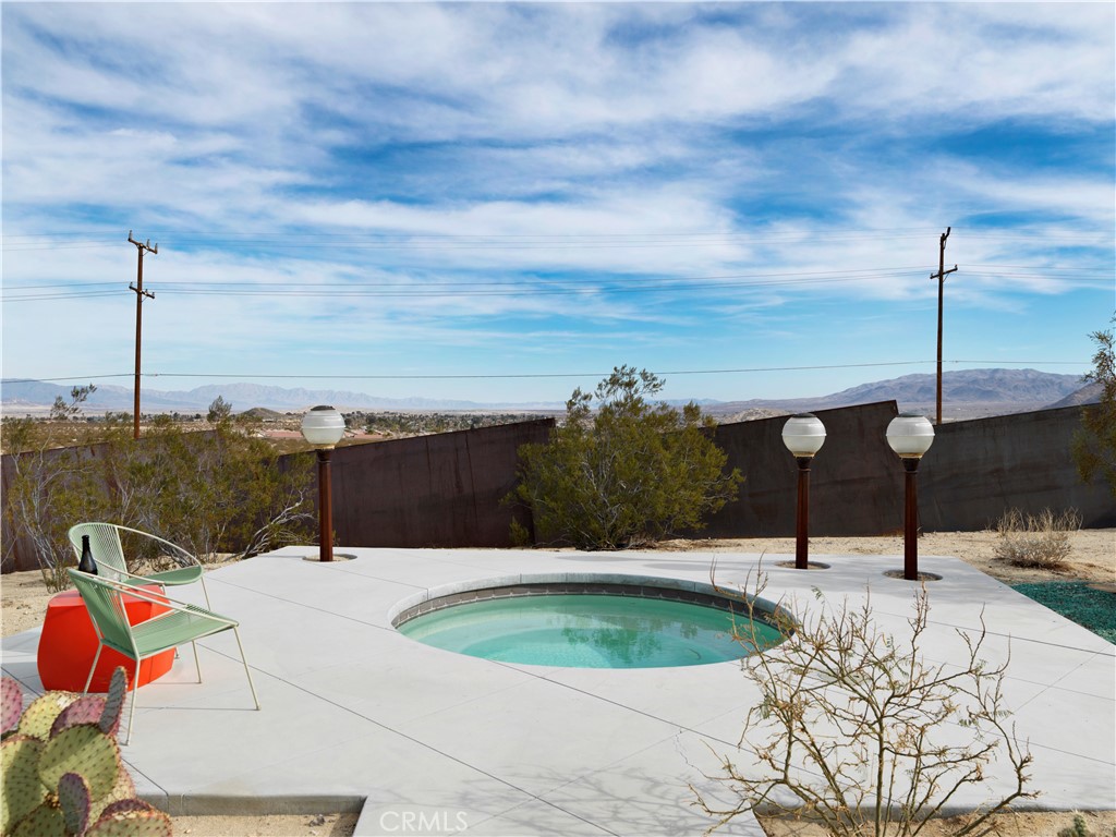 5960 Sunrise Road Twentynine Palms, CA 92277 - Photo 53 of 65 a view of swimming pool with a patio