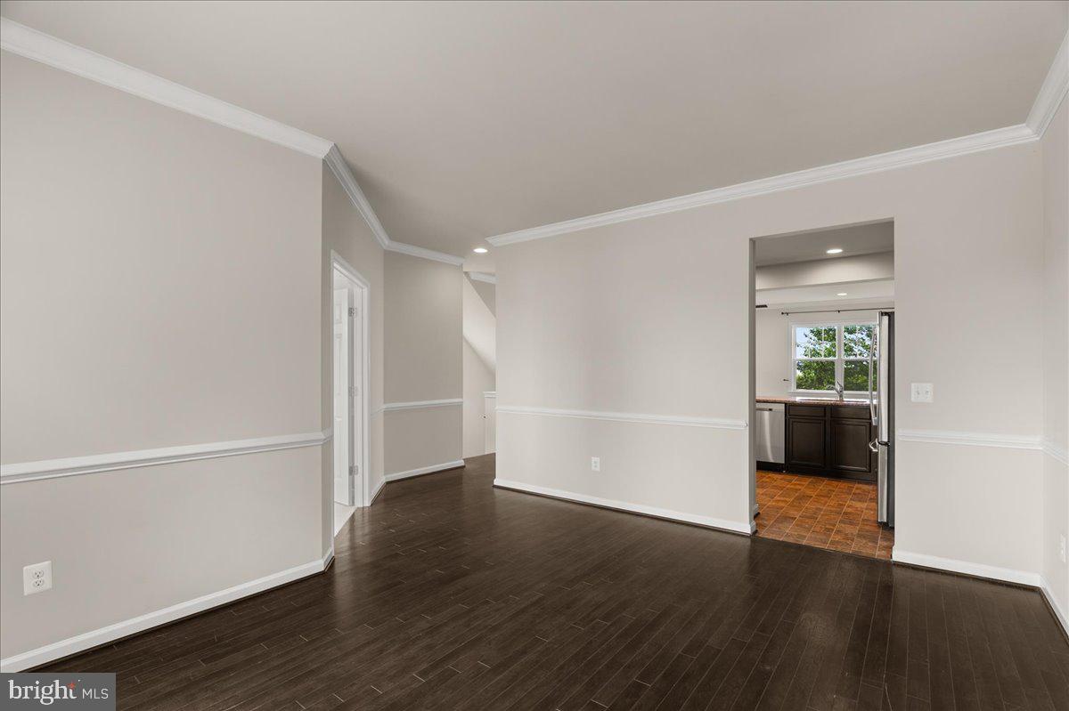 101 Jitterbug Way Stephenson, VA 22656 - Photo 13 of 39 an empty room with wooden floor and windows