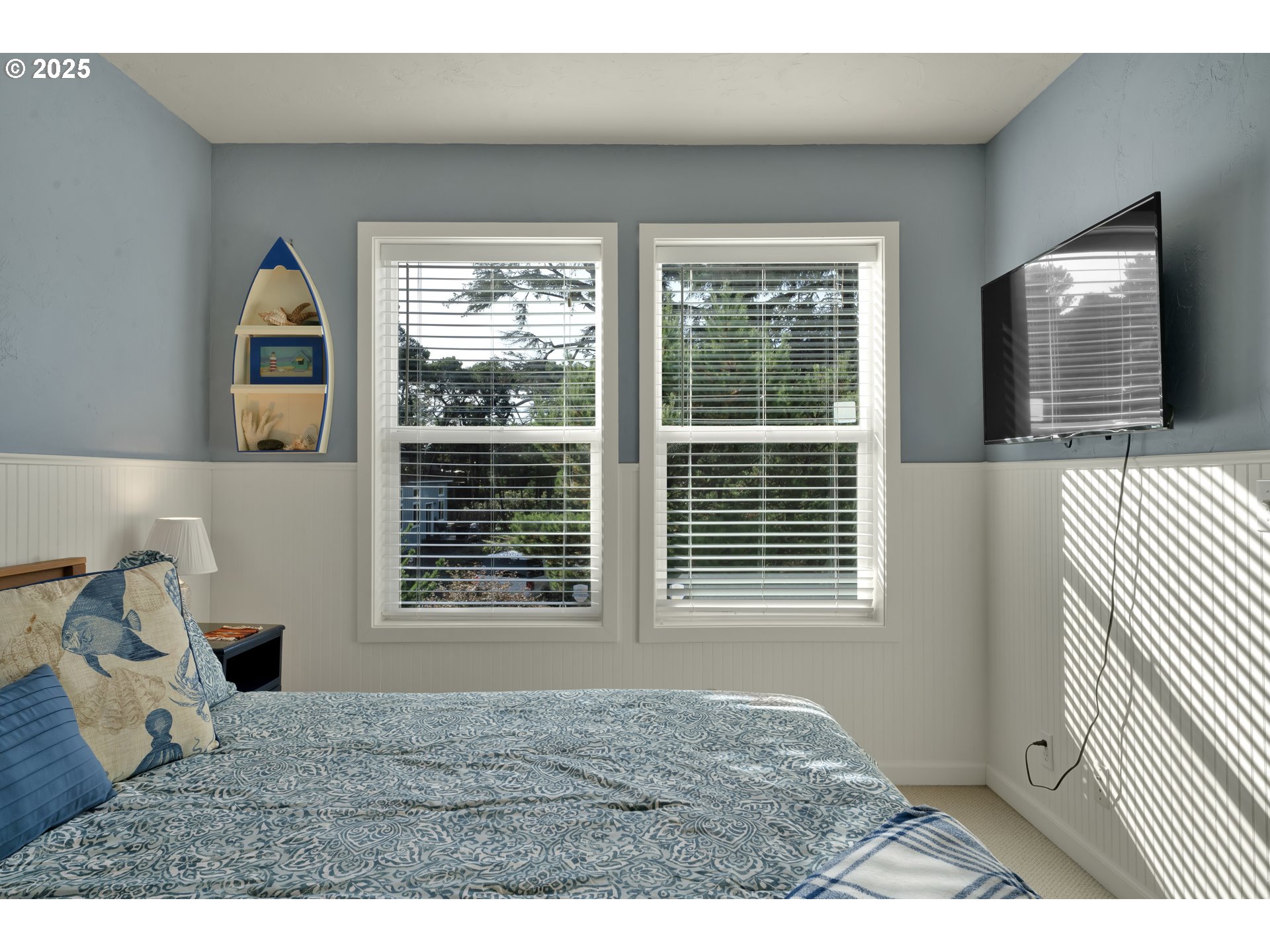 4567 Heceta Street Florence, OR 97439 - Photo 11 of 46 a house view with a window and a chair