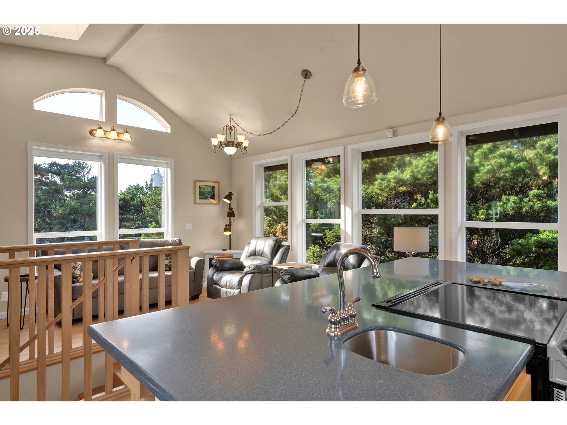 4567 Heceta Street Florence, OR 97439 - Photo 18 of 46 a kitchen with large windows and a sink