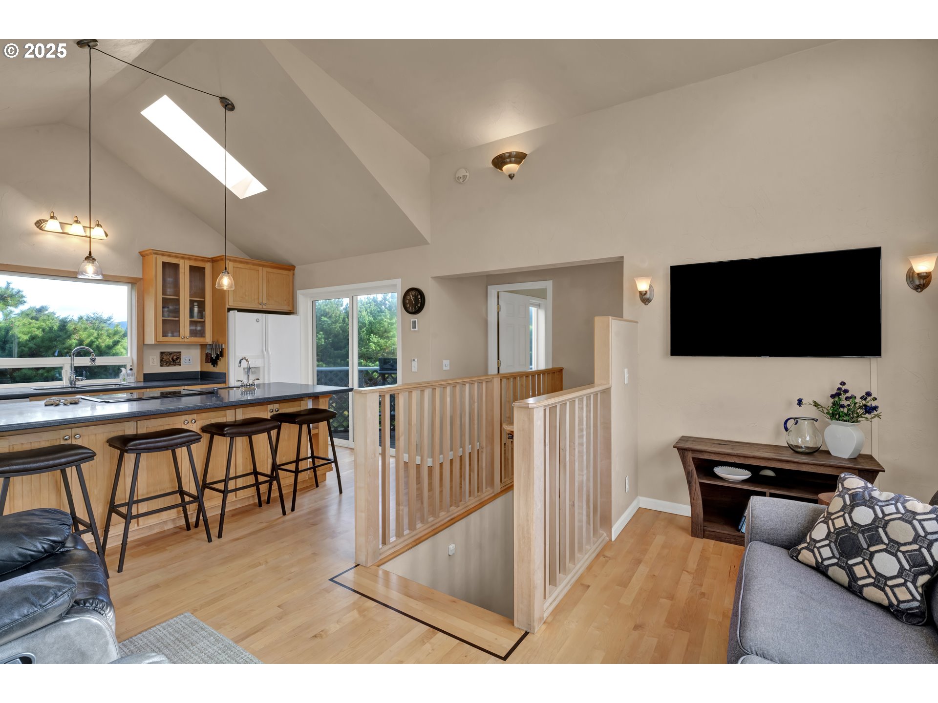 4567 Heceta Street Florence, OR 97439 - Photo 24 of 46 a view of a living room and a flat screen tv