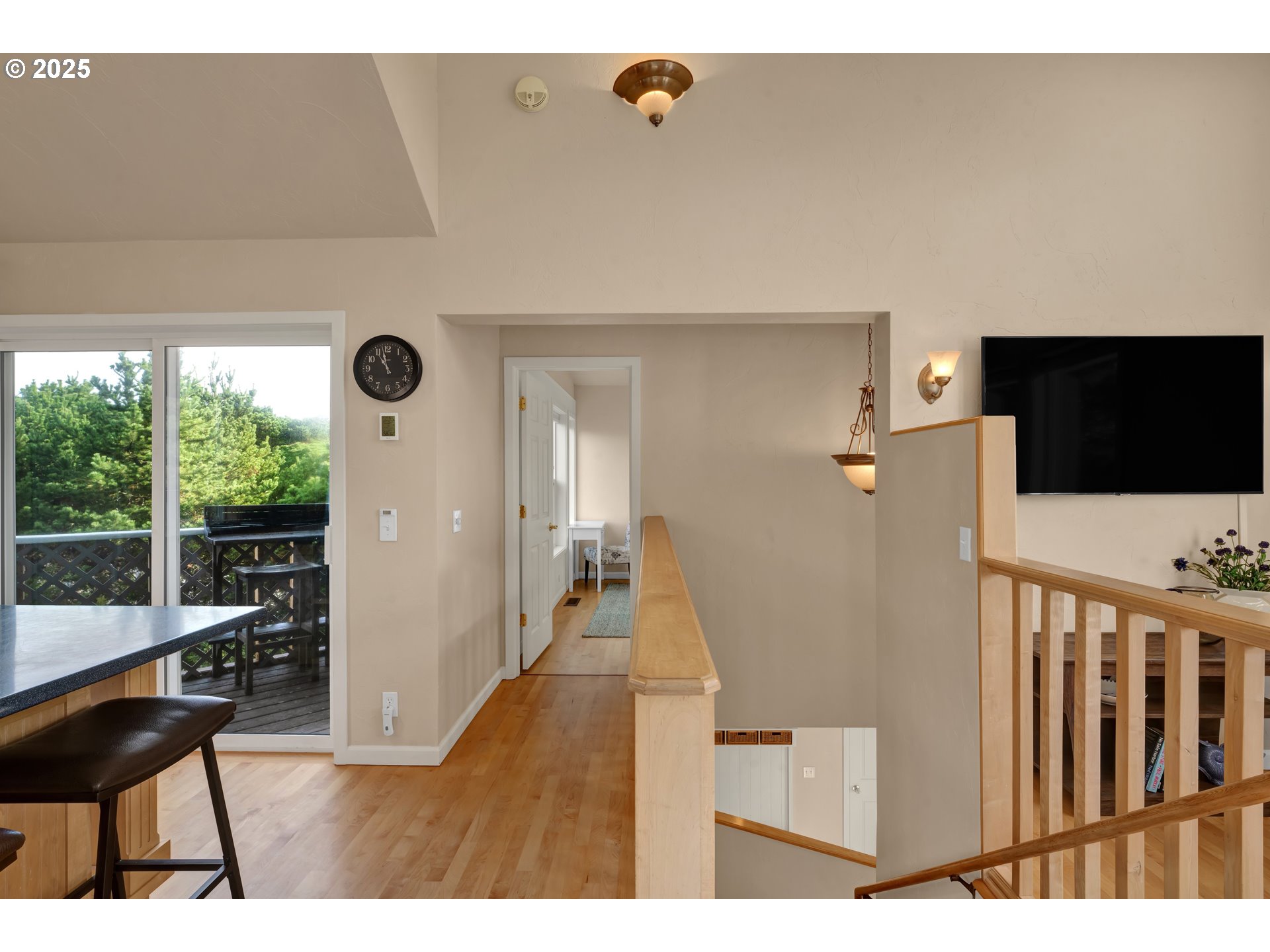 4567 Heceta Street Florence, OR 97439 - Photo 26 of 46 a living room with furniture and a flat screen tv