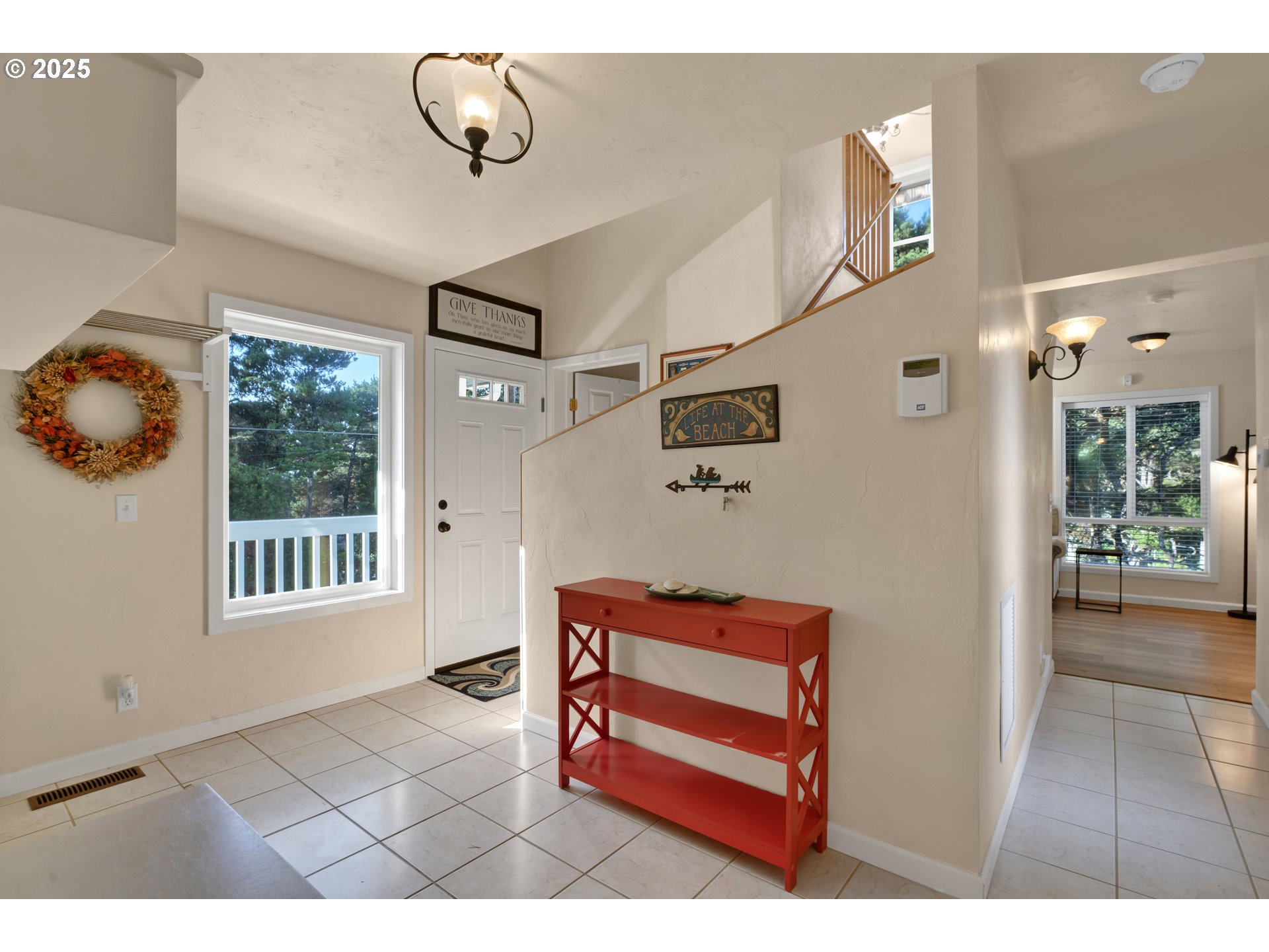 4567 Heceta Street Florence, OR 97439 - Photo 3 of 46 a view of a livingroom with furniture and windows