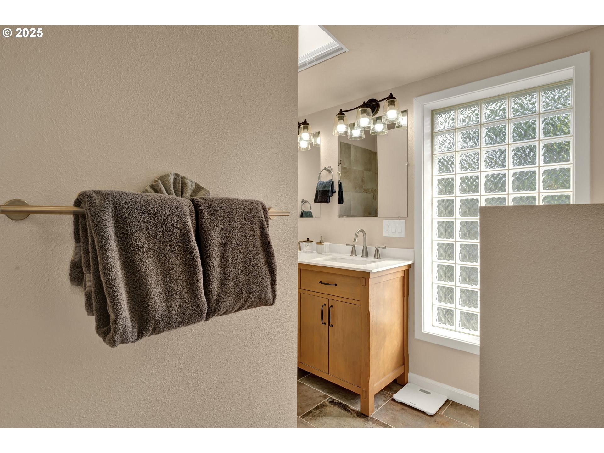 4567 Heceta Street Florence, OR 97439 - Photo 31 of 46 a bathroom with a sink and mirror