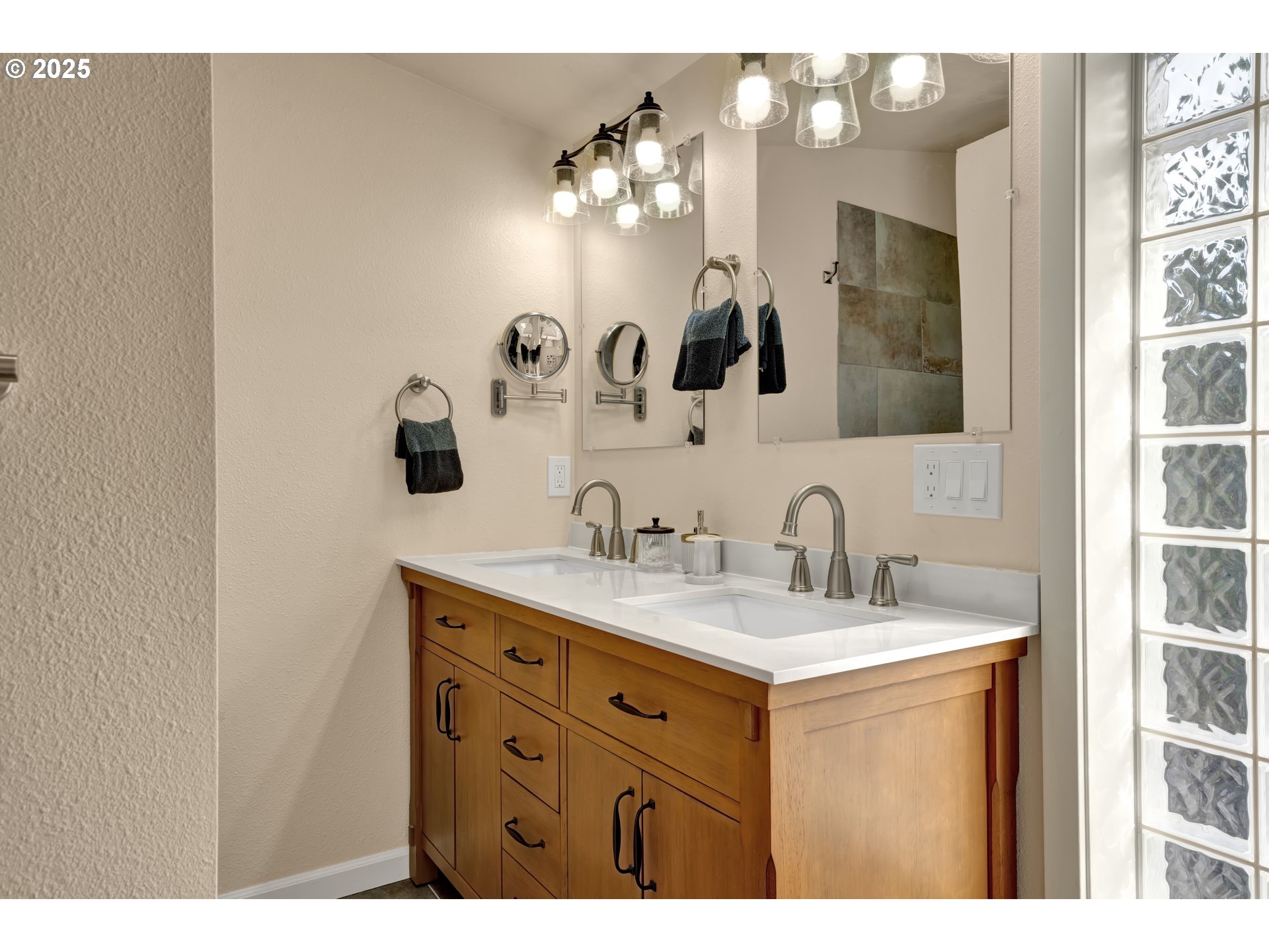 4567 Heceta Street Florence, OR 97439 - Photo 32 of 46 a bathroom with a sink vanity and a mirror