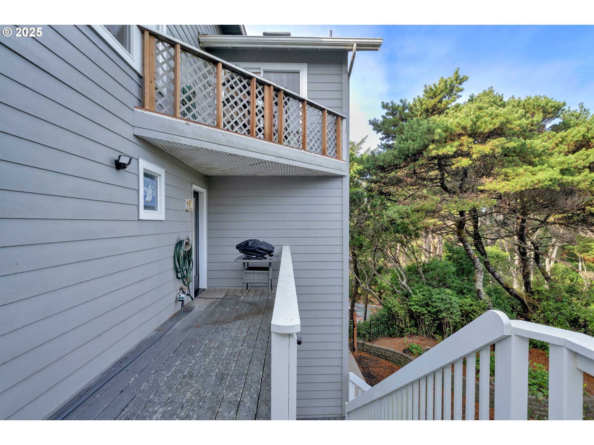 4567 Heceta Street Florence, OR 97439 - Photo 36 of 46 a view of a wooden fence and a pathway