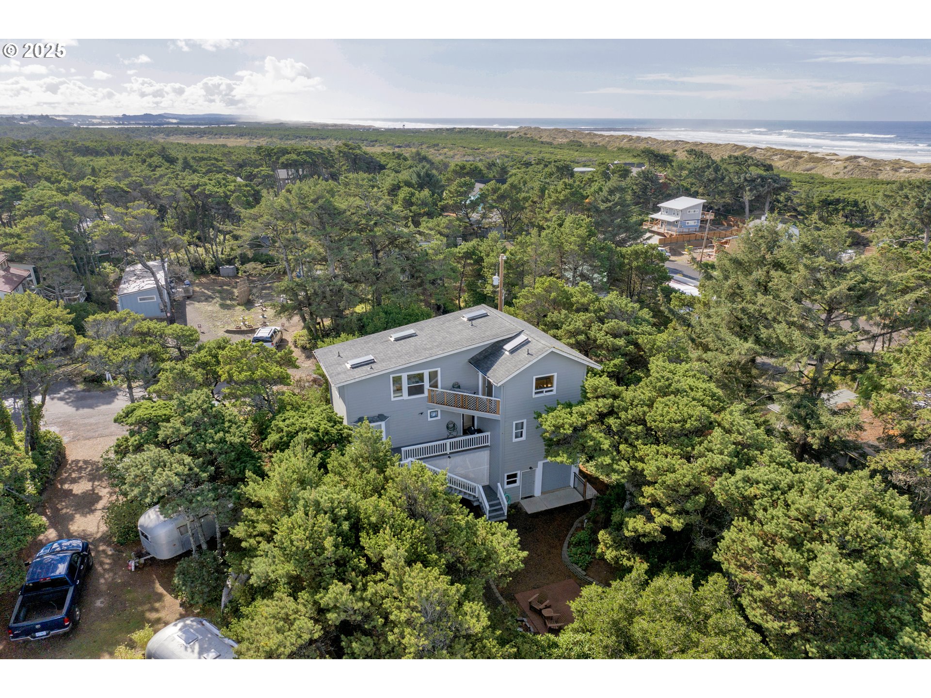 4567 Heceta Street Florence, OR 97439 - Photo 42 of 46 a view of a city with an outdoor space