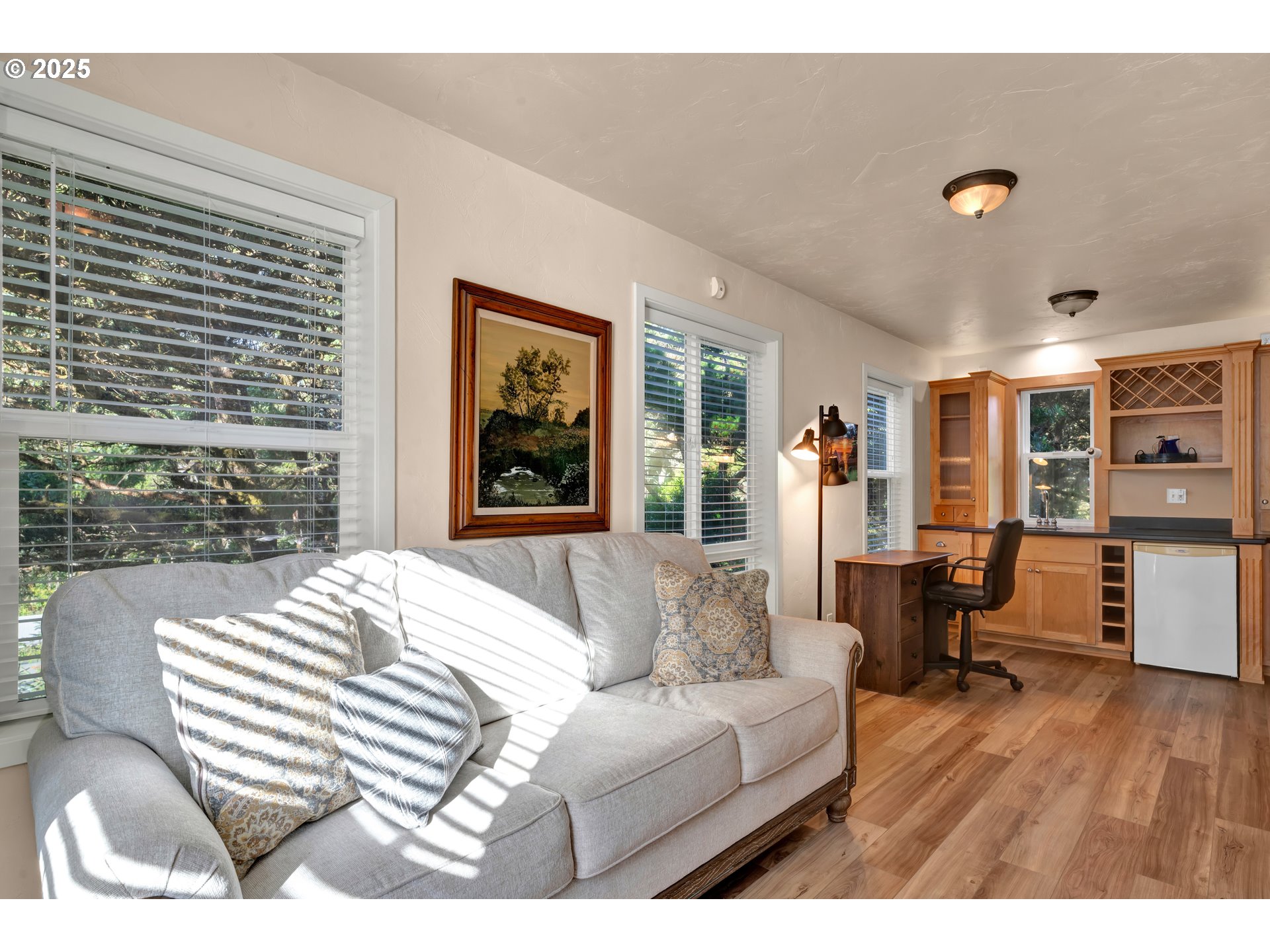 4567 Heceta Street Florence, OR 97439 - Photo 9 of 46 a living room with furniture and a wooden floor
