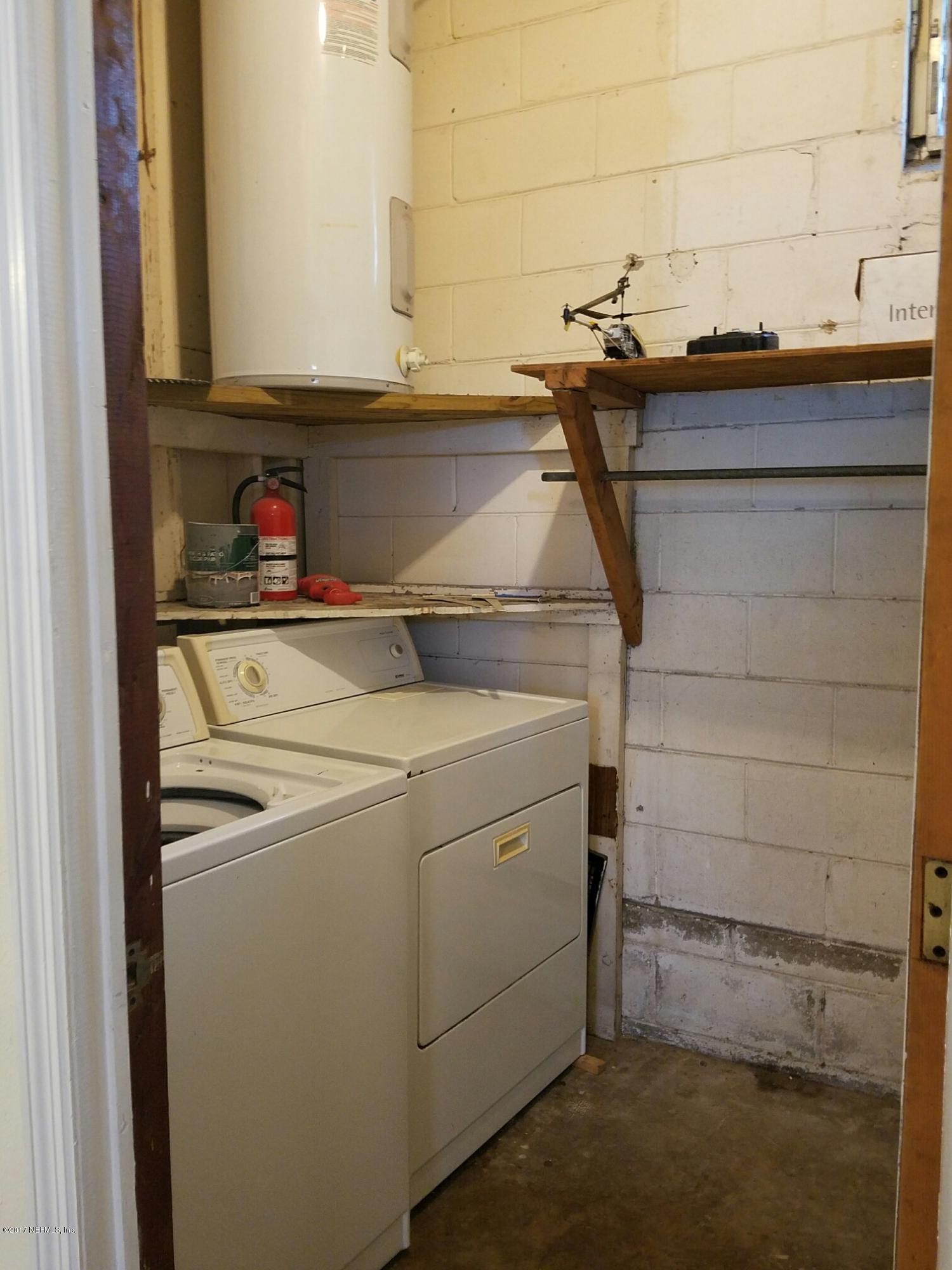 6556 Todd Road Jacksonville, FL 32216 - Photo 12 of 17 a utility room with dryer and washer